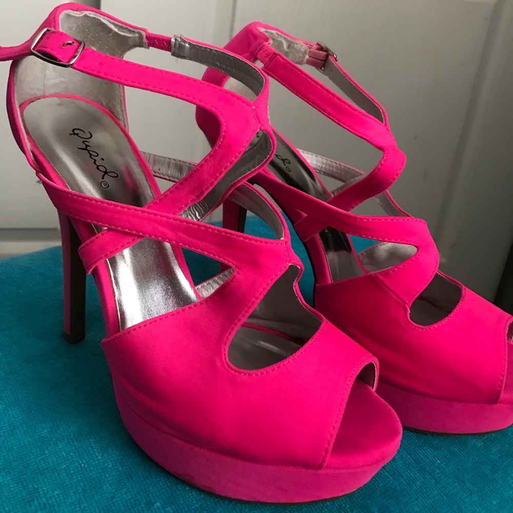 Neon pink platform heels